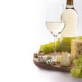 White wine, cheese, nuts and grapes for snack Royalty Free Stock Photo