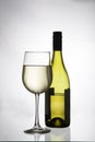 White wine in a glass and bottle