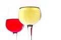 White wine in a glass on red wine background Royalty Free Stock Photo