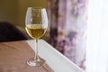 White wine in a glass  on a table in a restoran Royalty Free Stock Photo