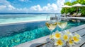 White wine in glasses with the pool and sandy beach and ocean on the background - AI Generated Royalty Free Stock Photo