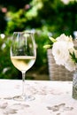 White wine in luxury restaurant on summer garden terrace, wine tasting experience at winery in the vineyard, gourmet Royalty Free Stock Photo