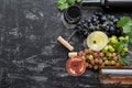 White wine rose and red wine in glasses. Types of wine in bottles. Different varieties grapes pink black green. Wine Royalty Free Stock Photo