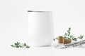 White wine tumbler mockup scene with thyme leaves, bottle opener and cork. Royalty Free Stock Photo