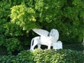 White winged marble `lion of St. Mark` in the Park of Yusupov Palace. The Palace was built in the style of the modernized Italian Royalty Free Stock Photo