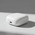 White wireless earbuds charging case Royalty Free Stock Photo