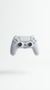 White wireless game controller floating on a minimal background