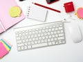 White wireless keyboard, computer mouse and paper notebook Royalty Free Stock Photo