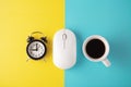 White wireless mouse with clock and coffee cup
