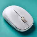 White wireless mouse on teal background, sleek and modern design. Royalty Free Stock Photo