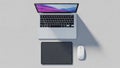 The white wireless mouse is to the right of the tablet. All items rest on Royalty Free Stock Photo