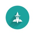 White Wizard warlock icon isolated with long shadow. Green circle button. Vector Illustration.