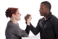 White woman and black man doing arm wrestling