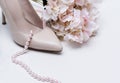 White womens boat Shoe, pink pearl necklace, rose hydrangea flower