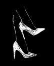 White women`s high-heeled shoes on a black background Royalty Free Stock Photo