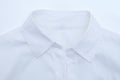 White women shirt with a collar close-up on white background