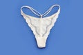 White womens lace panties on blue background