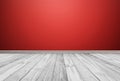 White wood floor panels with red wall background