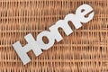 White Wood Sign Home On The Rustic Wicker Background Royalty Free Stock Photo