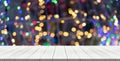 White wood table top on christmas light blurred background for montage your product