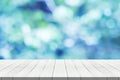 wood table top on nature blue blurred background for montage your product Royalty Free Stock Photo