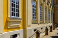 White wood windows. yellow stucco elevation. old classic architecture