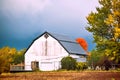 White Wooden Barn, Storm Clouds, Autumn Royalty Free Stock Photo