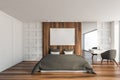 White and wooden bedroom interior with poster Royalty Free Stock Photo