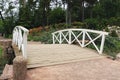 White wooden bridge in the park Royalty Free Stock Photo