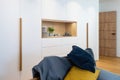 White wooden closet in bedroom