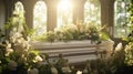 White wooden coffin with white flowers in church on the funeral Royalty Free Stock Photo