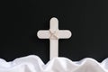 White wooden cross and fabric as symbol of heaven. Funeral and burial backdrop and sympathy card design. Royalty Free Stock Photo