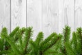 White wooden desk and green christmas tree Royalty Free Stock Photo