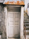 White wooden door in an old stone wall Royalty Free Stock Photo