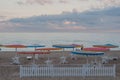 White wooden fence on beach foreground Royalty Free Stock Photo