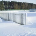 Fence separating land plots