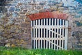 White wooden gate in an old cornish wall