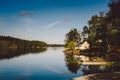 White wooden house on the lake Royalty Free Stock Photo