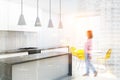 White wooden kitchen corner, yellow chairs blurred Royalty Free Stock Photo