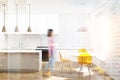 White wooden kitchen, yellow chairs blurred Royalty Free Stock Photo