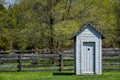 White Wooden Outhouse - Old Fashioned Bathroom Royalty Free Stock Photo