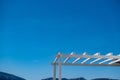 White wooden pergola. Canopy sunshade and house decoration, clear blue sky background, copy space