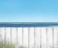 White Wooden Plank Fence on Beach Royalty Free Stock Photo