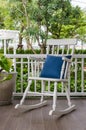 White wooden rocking chair on front porch Royalty Free Stock Photo