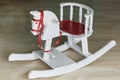 White wooden rocking horse chair. Royalty Free Stock Photo