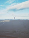 White wooden safe house beach cloudy sky