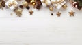 White wooden table with christmas tree and decorations top view. Free space for text. Christmas balls, bow, walnut, pine cone, Royalty Free Stock Photo