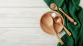 White wooden table covered with green tablecloth and cooking utensils. Generative Ai Royalty Free Stock Photo