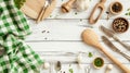 White wooden table covered with green tablecloth and cooking utensils. Generative Ai Royalty Free Stock Photo