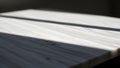 White Wooden Table Surface with Dramatic Lighting Royalty Free Stock Photo